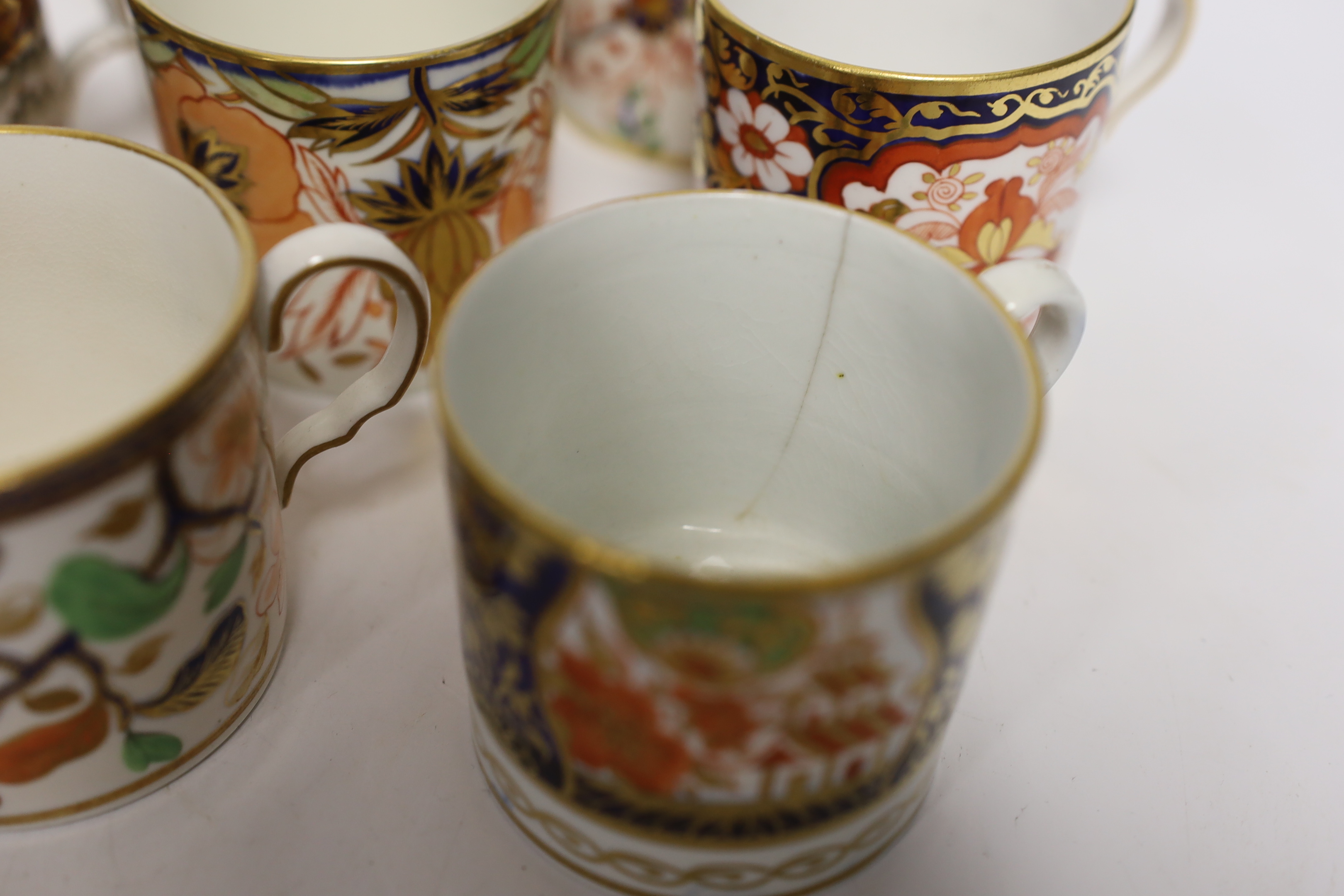 Twelve 1800-1820 English Imari patterned coffee cans